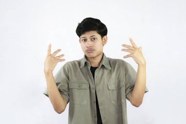 Sinirli, sinirli ve Asyalı Asyalı yakışıklı erkek öğrenci, jest yok diyor.