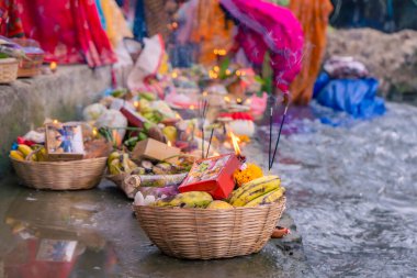 Chhath Puja Parwa Sun God Celebration with Fruits, Lights and Lamps in riverside in Nepal and India with lights, lamps diya after diwali clipart