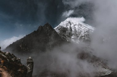 Very Cloudy Himalayan Mountain of  Langtang Lirung Peak in Kyanjin Ri Gompa Trekking Nepal clipart