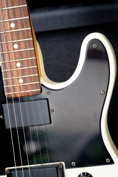 Electric guitar in a recording studio. Close-up of electric guitar.