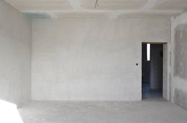 Bitmemiş bir binada oturma odası.