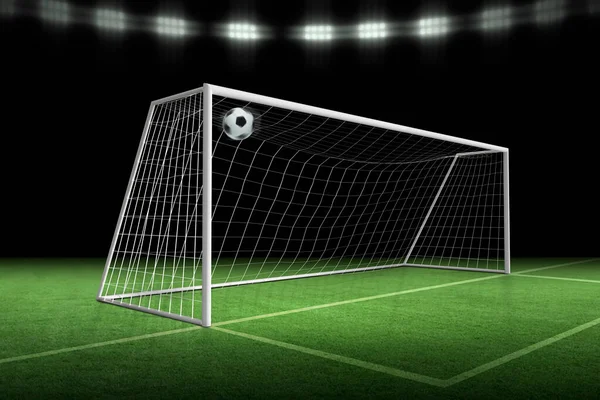 サッカーボールのゴール スタジアムのスポットライトの背景 — ストック写真