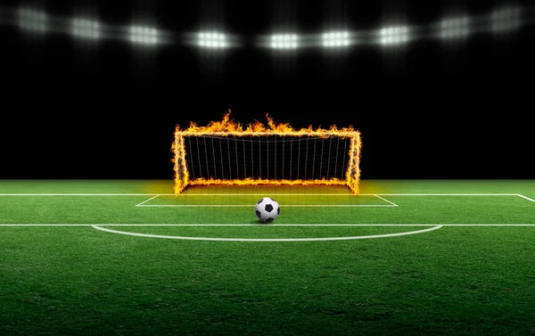 Soccer ball and the heat of the flames of the soccer goalposts, Football field competition concept