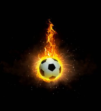 Soccer ball, on fire on black background