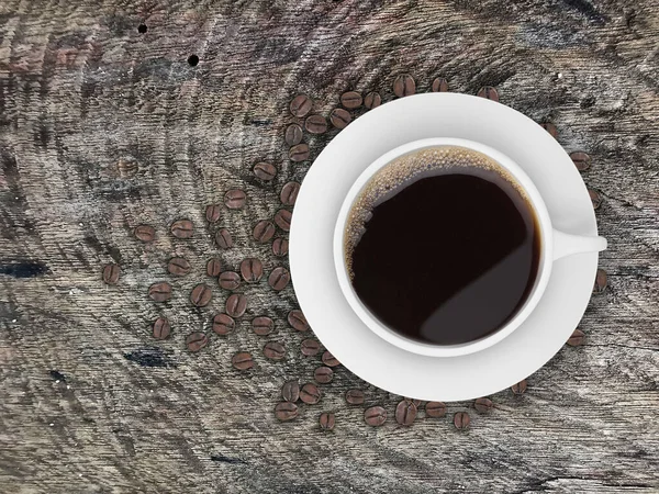 Draufsicht Auf Eine Kaffeetasse Und Bohnen Auf Einem Holztisch — Stockfoto