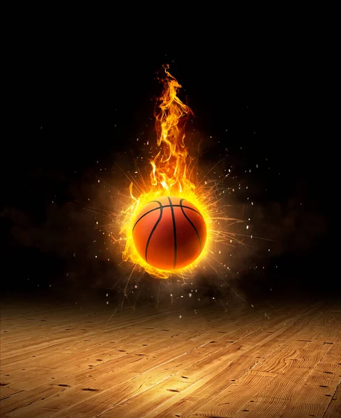basketball on fire, a dark background on a hardwood gym floor