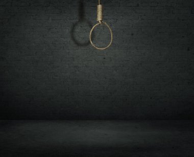 İntihar konsepti. Karanlık duvar arkaplanında gölgesi olan ilmik