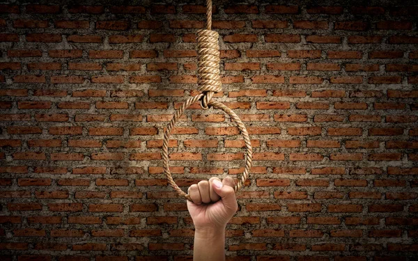 Hand Holding Rope Noose Hangman Knot Hanging Dark Brick Wall — Stock Photo, Image