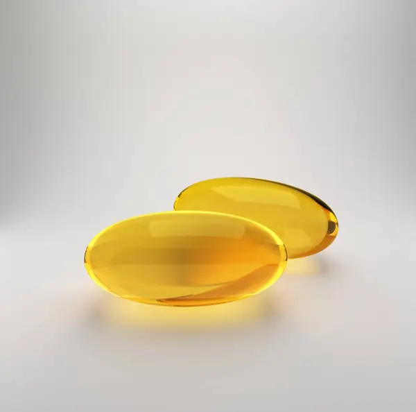 ビタミンA オメガ3またはコラーゲンのゴールドオイルカプセル 魚の脂肪か有機化粧品のオイルが付いている医学の丸薬 — ストック写真