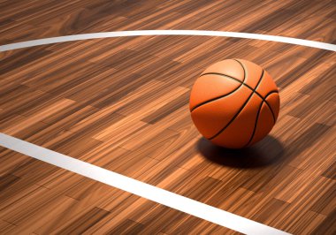 Hardwood basketbol sahasında resmi bir turuncu basketbol topu.