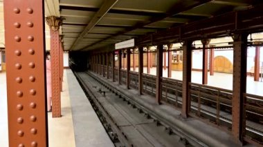 Budapest, Hungary, August 2022. Footage at the m1 metro station, the historic first line of the city. You see the light emerge from the tunnel: the subway arrives.
