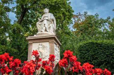 Vienna, Austria, August 21, 2022. Beautiful shot of the Franz Schubert monument at the Stadtpark. Low angle shot. clipart