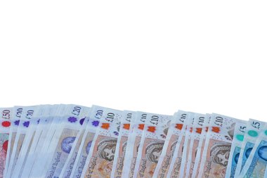 Beyaz arka planda sterling notlarının yayılması.