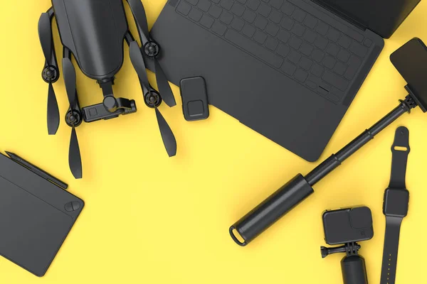 Top view of monochrome designer workspace and gear like laptop, tablet, drone, tripod and action camera on yellow background. 3d render of accessories for drawing, sketching and photography tools