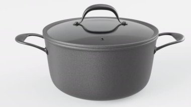 Beyaz arka planda krom kaplamalı ve krom kaplamalı paslanmaz çelik fırın. Yapışmayan mutfak gereçleri ya da çömlek