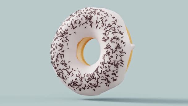 Donut Acristalado Chocolate Con Aspersiones Que Giran Sobre Fondo Gris — Vídeos de Stock