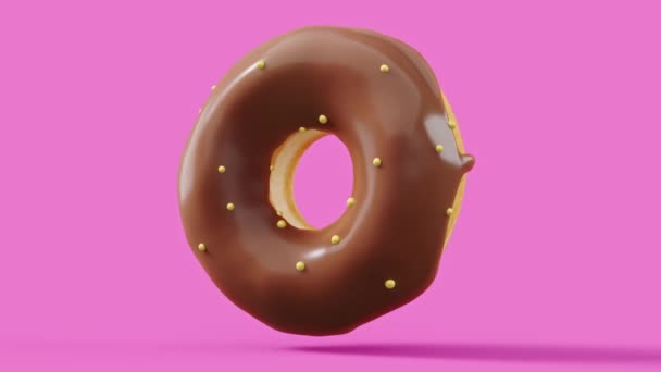 Pembe Arka Planda Dönen Çikolata Kaplı Donutla Tasvir Pasta Şekerlemelerin — Stok video