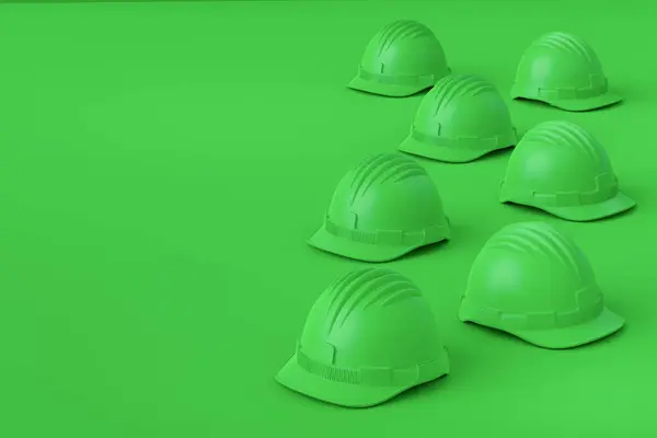 Set of monochrome safety helmets or hard caps isolated on multicolor background. 3d render and illustration of headgear