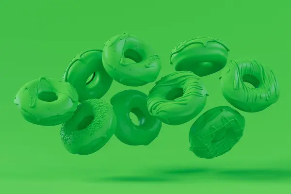 Шоколадный Пончик Глазурью Движении Падает Простой Монохромно Зеленый Цвет Фона Стоковое Фото