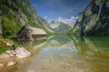 View of Bootshaus am Obersee lake in Berchtesgaden National Park, Upper Bavarian Alps, Germany, Europe. Beauty of nature concept background. clipart