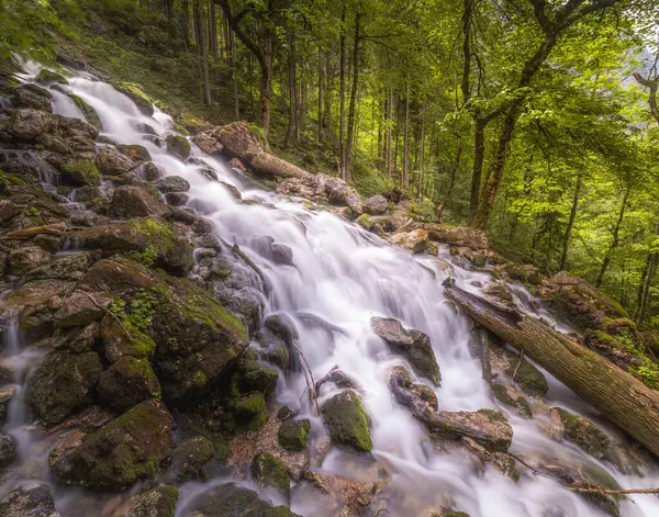 stock image Beautiful view of Rothbach Waterfall near Konigssee lake in Berchtesgaden National Park, Upper Bavarian Alps, Germany, Europe. Beauty of nature concept background.