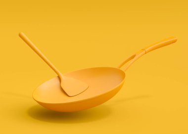 Ahşap mutfak aletleri, aletler ve ekipmanlar sarı monokrom arka planda. Ev yapımı mutfak aletleri ve yemek pişirmek için aksesuarlar