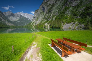 Beautiful view of mountain valley with tracks near Obersee lake in Berchtesgaden National Park, Upper Bavarian Alps, Germany, Europe. Beauty of nature concept background. clipart