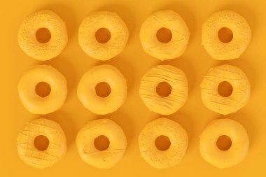 Sade tek renkli arkaplan üzerine serpiştirilmiş jöleli donut manzarası ve fotokopi alanı. Fast food fırınının 3 boyutlu tasarım elementleri.