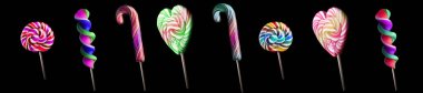 izole siyah arka plan üzerine parlak renkli lolipop