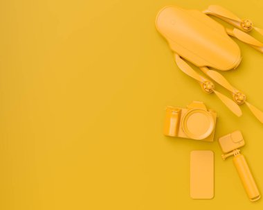 Mevcut olmayan DSLR kamera, cep telefonu, monokrom arka planda selfie çubuğundaki dron ve aksiyon kamerası gibi tasarımcı çalışma alanının ve teçhizatının üst görüntüsü. Canlı yayın için 3D aksesuar hazırlama