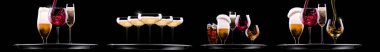 Bira, martini, soda, şampanya, siyah arka planda izole edilmiş viski gibi farklı alkollü kokteyllerle el ele tutuşmalar.