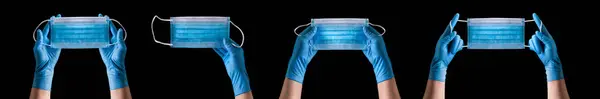 stock image Doctor's hand in medical gloves wearing a mask isolated on black background with clipping path. Concept of protection against pandemic and viruses.