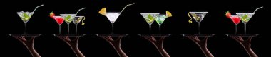 Bira, martini, soda, şampanya, siyah arka planda izole edilmiş viski gibi farklı alkollü kokteyllerle el ele tutuşmalar.