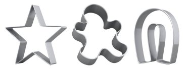 Beyaz arka planda ev yapımı Noel bisküvisi için metal kurabiye keskisi seti. Mutfakta 3 boyutlu zencefilli kurabiye tarifi..