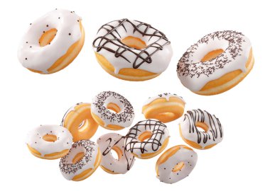 Beyaz çikolata kaplı çörekler, serpiştirmeler, beyaz çiselemeler ve beyaz şeffaf arka planda izole edilmiş noktalar. 3D görüntüleme ve tatlı çeşitliliği