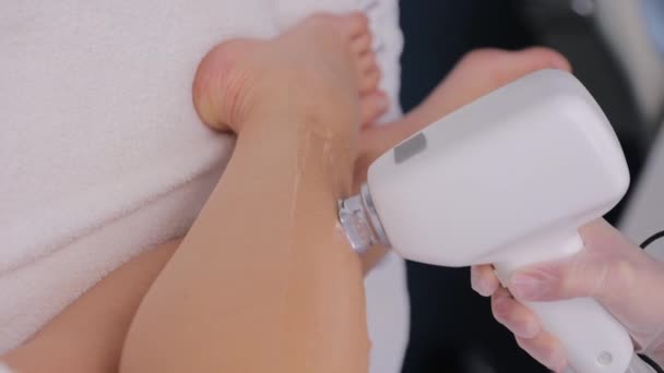 Beautician Removes Hair Womans Legs Hair Removal Smooth Skin Laser — Stock Video