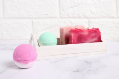 Bath bomb with soap  lifestyle in bathroom, wellness treatment