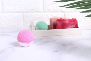Bath bomb with soap  lifestyle in bathroom, wellness treatment