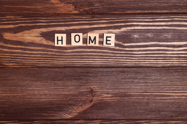 Home Schriftzug Wort Auf Holz Hintergrund — Stockfoto