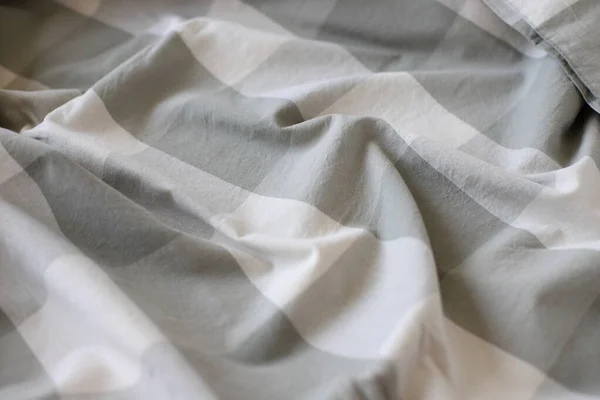 ベッド毛布綿の正方形のパターン 居心地の良いホームテキスタイルの背景 — ストック写真