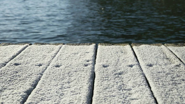 Snow Winter Background Wooden Pier Covered Snow Water Top View Stockbild