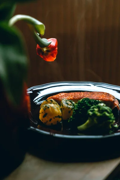 Food photography of salmon and tulips