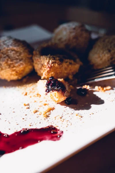A bite of plum dumpling 