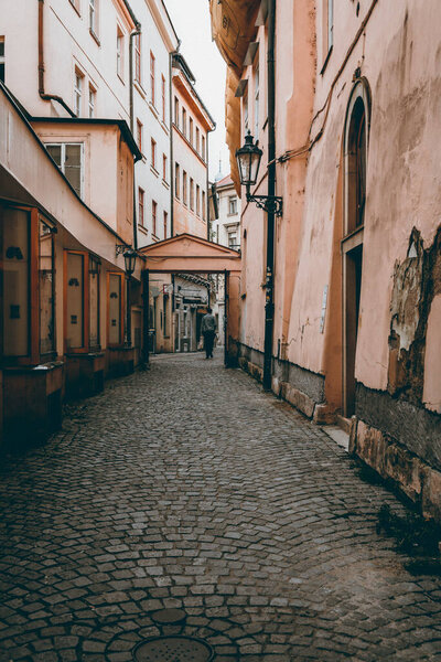 Charming Prague alley with cobblestone streets
