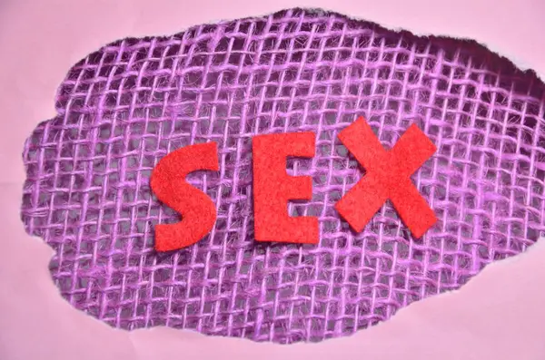 Soyut renkli bir arka planda kelime seksi. seks arkaplanı