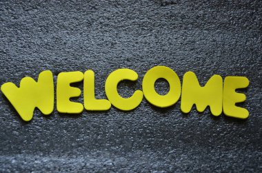 Ahşap arkaplanda karşılama metni