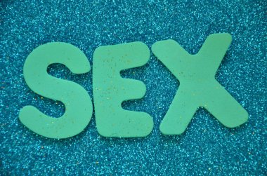 Soyut renkli bir arkaplanda seks kelimesi