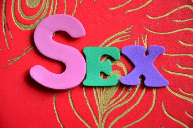renkli bir arka plan üzerinde kelime seks