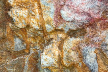 Arkaplan için renkli ve desenli taşlar.