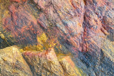 Arkaplan için renkli kayaların deseni.